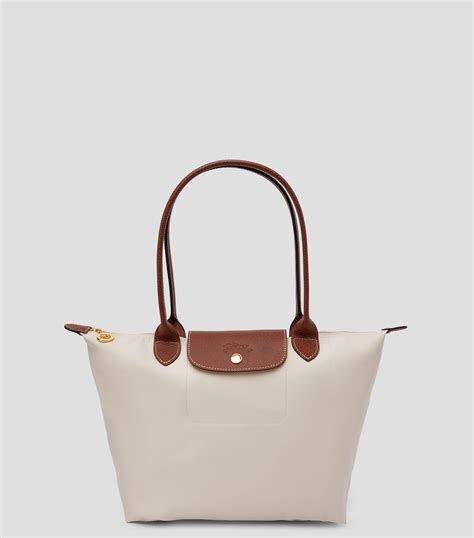 bolso longchamp beige